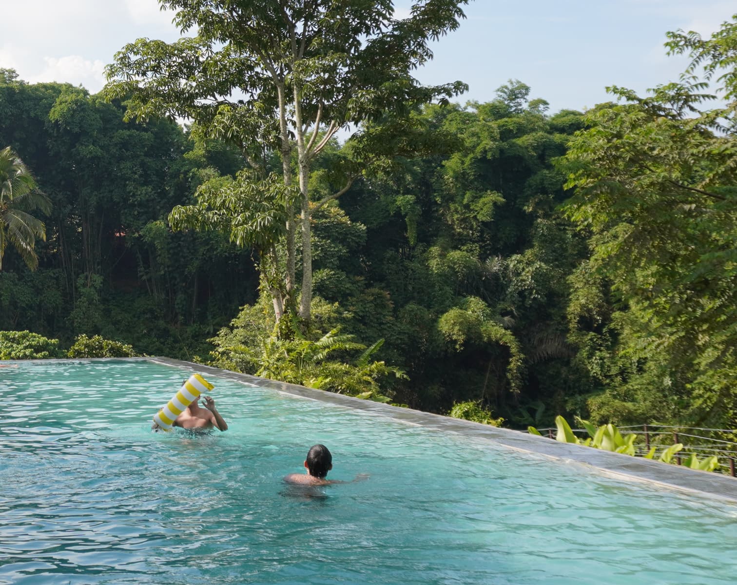 Hidden Gardens pool surrounded by tropical trees